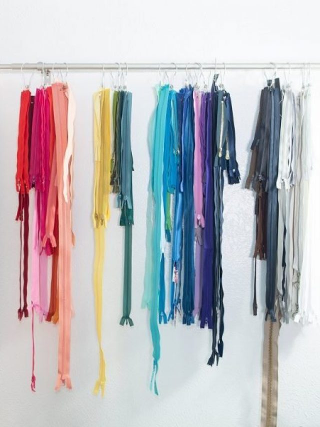 zippers hanging on curtain rod